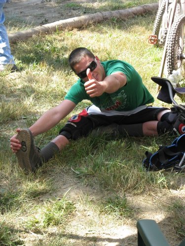 Thumbs Up from Kieran Bennet while stretching.