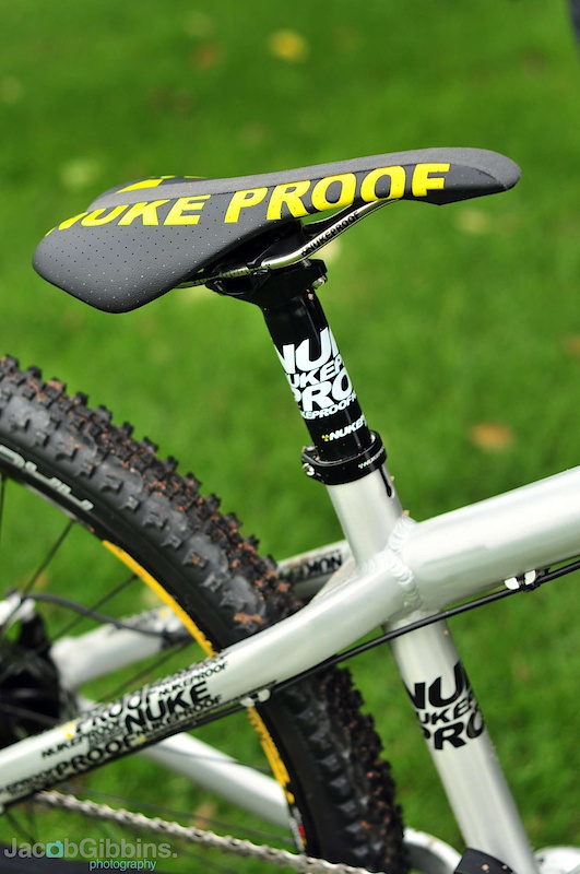 It's a subtle change and one which is perhaps not picked up on by many, but the name in previous years has been 'Nuke Proof', but revised graphics bring about a consolidation to 'Nukeproof'. Moving from utilitarian graphics, these look much slicker and bring with them an increased number of finishing options: Lacquered raw, Yellow & Black. The raw shown here is very brushed, the final is likely to be more along the lines of the pedals seen below which feature a more tarnished effect.