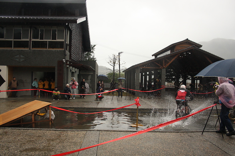 A Taiwanese racer getting his splash on