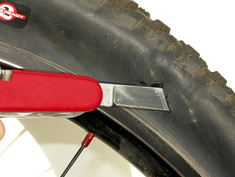 fixing a flat tire near sidewall
