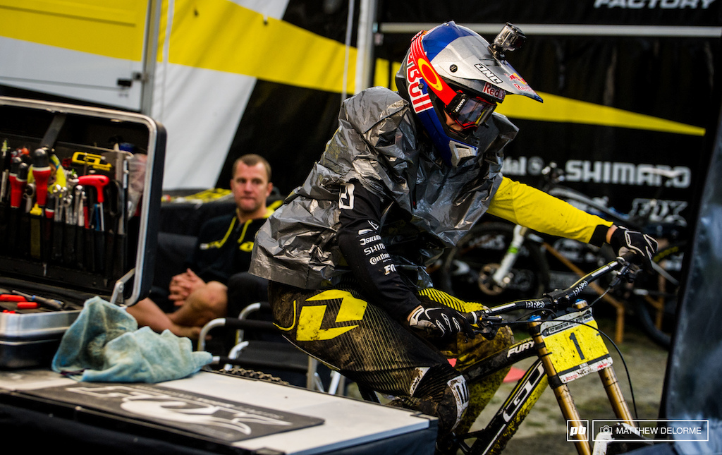 Water repellence was the top order of the day by any means necessary. Rachel Atherton donning the silver suit of dryness plus 2.