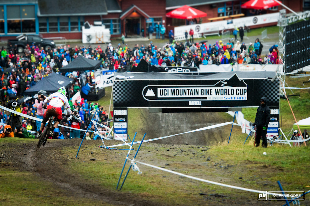 Greg Minnaar powering through the muck just enough to make the podium.