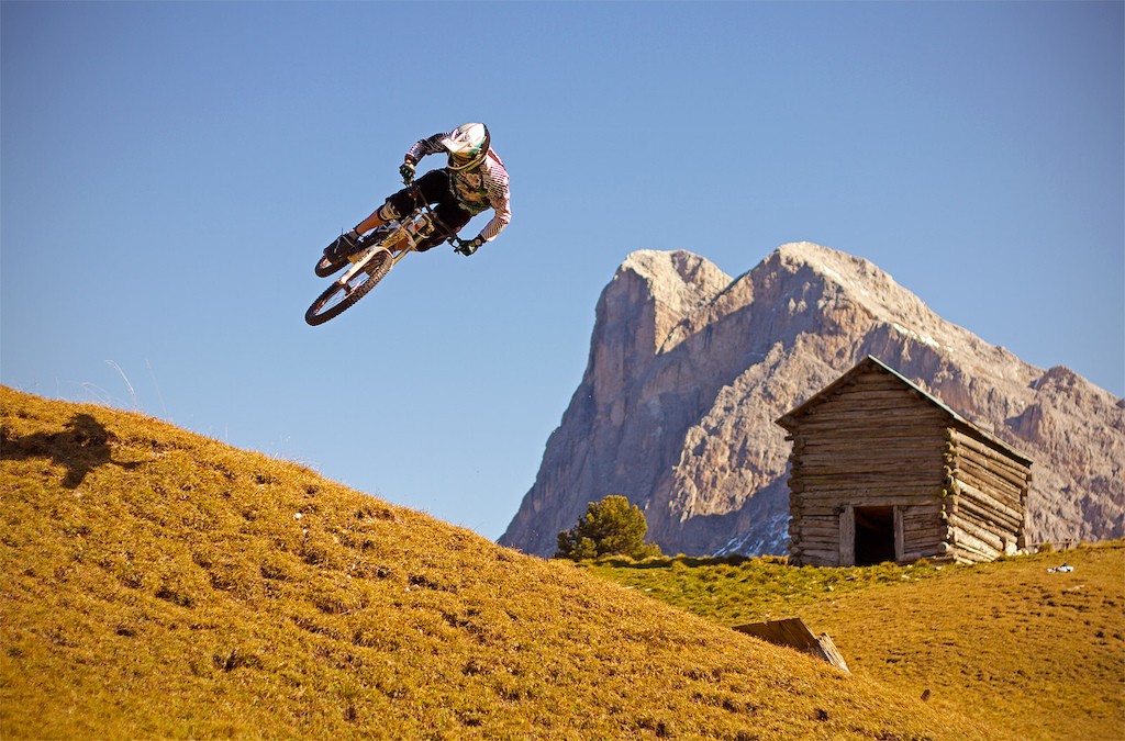 Fischi goes braaaap over a selfmade hip jump on his GHOST DH. Photo c by www.larsscharlphoto.com me
