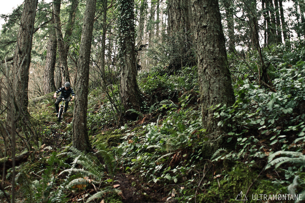 Staying nimble on this rocky and rooty off-camber goat path.