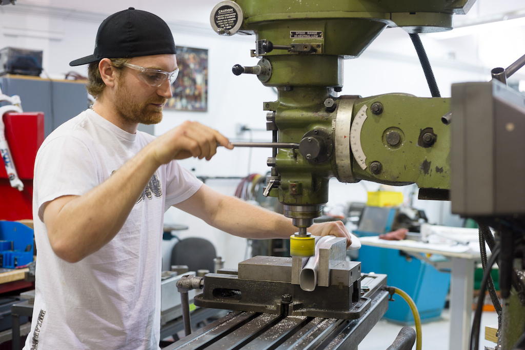 XXX cuts a joint on a tube for a new frame for Thomas Vanderham.