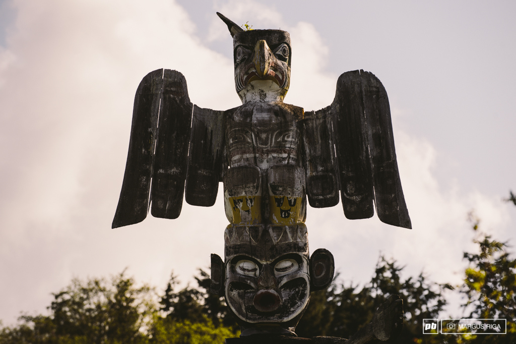 The totems on Alert Bay are the real deal. Carved from real wood by real natives a long time ago.