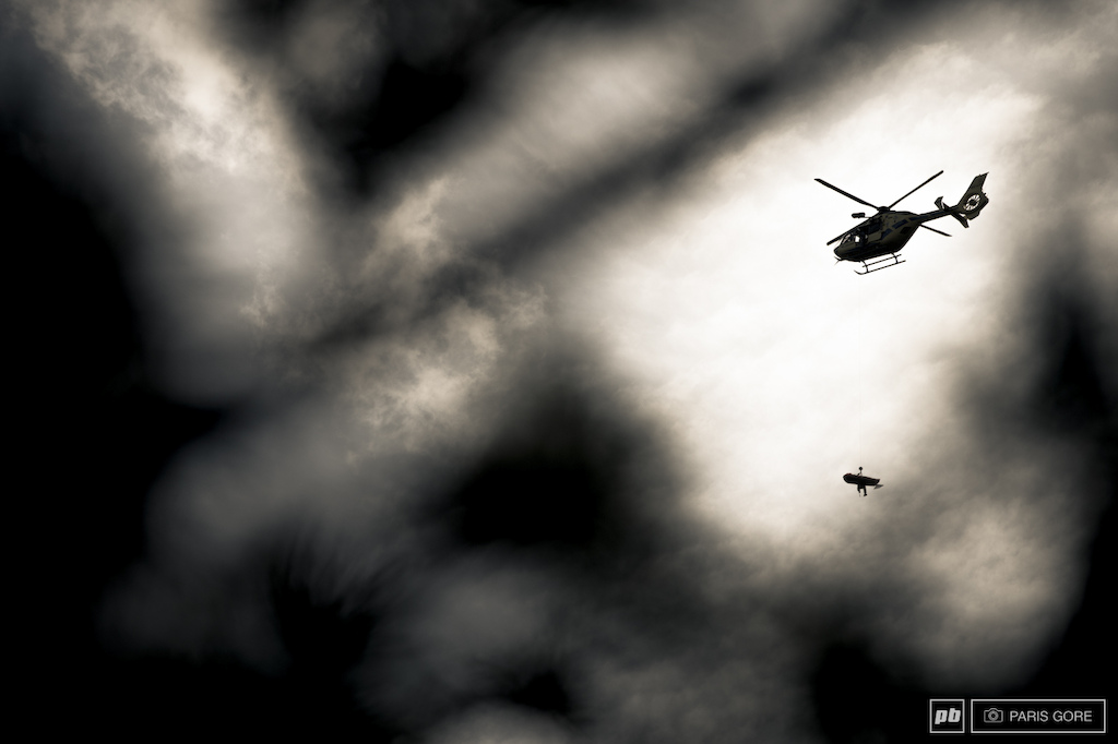 Cam Cole took one of the gnarliest crashes anyone s seen today. Seen here getting airlifted out of the woods. Also for anyone questioning why Red Bull cut the coverage. Due to the satellite time and production cost to put on live coverage runs well over 4 000 an hour. With such a big delay Red Bull had to pull the plug on the live coverage. You can still watch the replay though.