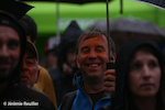 Father of Jerome bellow the rain during the podium