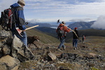 Volunteer and Carcross-Tagish First Nations youth trail builders start their morning commute down the historic Mountain Hero Trail, 3300 feet above Windy Arm, Carcross, Yukon." Photo: Derek Crowe