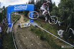 Josh Bryceland points towards glory. 1 of over  2,000 photos thought to be lost soon after the Fort William Finals. My CF card mysteriously disappeared for a few hours and was miraculously found by Kathy Sessler in the Santa Cruz pits.