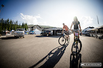 Rachel Atherton gives her bike the old parking lot compression test before practice starts tomorrow.