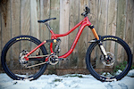 the entouRage all finished up.

custom build on a budget; not the flashiest componentry nor the highest spec, but built with reliability and ease of service in mind, with room to upgrade as and when.

Red ones go faster too.

2012 entourage frame (large)
Gold anodised pivot hardwear from Operator
Marzocchi 55cr fork
Fox Vanilla R shock, 450lb Ti spring
Nukeproof Generator DH wheel set
Minion DHf tyres with tubes
Zee brakes, 203mm rotors f + r
Raceface respond crankset, MRP G3 guide
RF 34t narrow wide
Zee derailleur, 28t 10 speed cassette
KMC ti-nitrate chain
Straitline Defacto pedals
Raceface respond 40mm stem
Thompson bars and seat post, Hope clamp 
Nukeproof trail saddle
ODI SDG grips

36lbs all up.