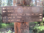 Sign at junction of Kelly Creek Trail and Gravelle Creek Trail. Note end of trail 1.6 miles.  That is far short of Heart Lake.