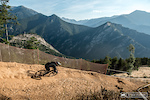 Miranda Miller raises one of the big berms up top during a very early morning practice session.