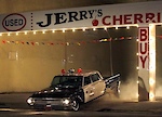 In celebration of the 35th anniversary of the 1973 film American Graffiti, a film crew re-created the cop car scene early Thursday morning