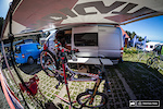 Steve Peat's team vans were parked up right by the finish line with a barbeque fired up in - throw another shrimp on Steve! Here he prepares himself for another race run to add to his list.