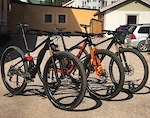 The Spark still isn't finished, but here it is in some good company.
Orange one is a custom built 900 SL with Bontrager wheels, XX1 drivetrain with Eagle cranks, MCFK, Selle Italia etc.
Black and green one is a stock 900 Ultimate.