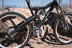 Yeti Seven. 7lb frame and 7" of travel using a single sided carbon chainstay and a carbon shock link.