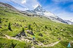 Tina Gerber and Sven on a trail just under the picuresque Matterhorn in Zermatt - outsideisfree.ch