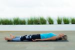 Corpse Pose for faster recovery, pain relief and reduced muscle tightness. Photo credit: Paul Baker