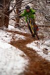 Manualing out of a loam berm on my first snow ride in Arkansas - self shot
