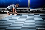 The MS behind the Mondraker team chipping in with the new floor for the gigantic 2019 pit set-up