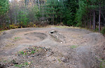 The backyard pump track is a work in progress in its first season. I'm still fine tuning and building, and I just recently scored some dirt and will begin to build it up more. Almost all of what you see here is from digging and moving "lawn", almost nothing "imported" at this point.