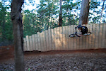 On the jump bike after the race. These berms have a fully welded steel frame supporting the timber.