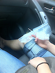 Sore knee and thumb being iced en route to shopping!