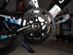 My customized compact chainring manufactured by fibre-lyte of Germany attached to stronglight carbon crank with Aerolite pedal, and KMC SL 10 speed chain.