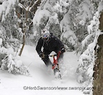 Riding at Burke Mountain on a powder day. Lenzsport Launch ski bike with Cyndrome Romp BC skis. Rideromp.com