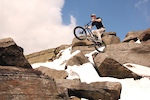 Ali C sending a drop-gap high up in the hills at Hathersage.