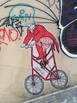 Headless bike rider graffiti