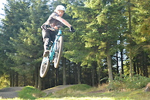 Riding the jumps at Glentress on my Shine. Photo credit Lewis Hobson (wetriverdoggy)