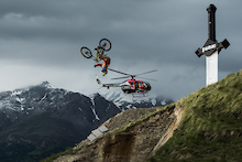 Peter Henke (GER) hitting the massive hip at the bottom of the freeride section of the Suzuki Nine Knights MTB 2014. Sticking his first ever hip flip with his Big Bike Henke is gunning for progression and is one to watch out for at the Contest Day, coming up on Saturday 21st of June.