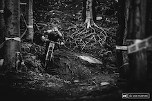 There is no room for error in the dark and slick woods that make up the bottom of the track.  Many a rider has been taken out in the rocks and roots this weekend.