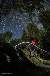 A not-so-common trail in the Stonebridge area in Whistler, I knew this rock roll could look good at night. This is a composite of about 100 images showing the movement of the stars, with Alex riding the rock roll in the first frame.