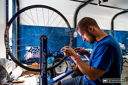 Stephan getting the spare wheels together before the storm, chez MS Mondraker.