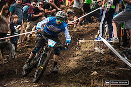 Foot out, flat out and fast as for Sam Hill in the slippery Irish dirt.