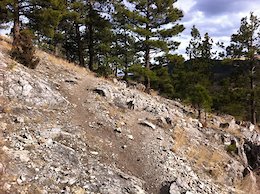 New(er) singletrack around rock outcrop on Contour Trail