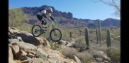 Playing on some rock features on the Tech loop, just off K-trail at Gold Canyon.