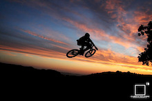 Duane throwing in a table in the sun set - Cubed Square Photography - Laurence CE