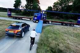 Video: Matt Jones Gaps Between Two Moving Semi Trucks in Latest Red Bull Stunt