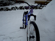 my bike with new fork and wheel next to my igloo
