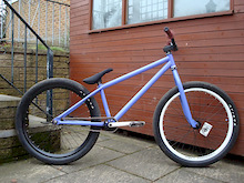 NS suburban24 with my rebate painted to the same colour purple and also with the disk brake mount grinded off the fork. brakeless