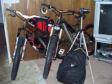 christmas stuff.. fork,bar on hardtail, demo 7, vid cam+tripod,backpack and fox launch suit