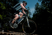 A rider crosses Sykes Bridge during the Island Cup XC race in Cumberland, BC on April 11th, 2010.