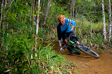 Seb Kemp rides his bike on trails near Blue Mountain in Jamaica at the Jamaica Fat Tyre Festival. This was part of the memorial ride for trail builder Ken Klowak who was killed last year in Mexico.
