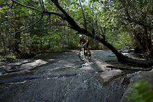Hunting for single track over the Victoria Day long weekend ended up revealing some amazing terrain in North Bay. Riding this shallow waterfall was how I cooled off and washed my bike at the end of the ride.