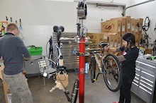 Our new employee Christine and Woody Chris putting together bicycles for the up coming Bicycle show